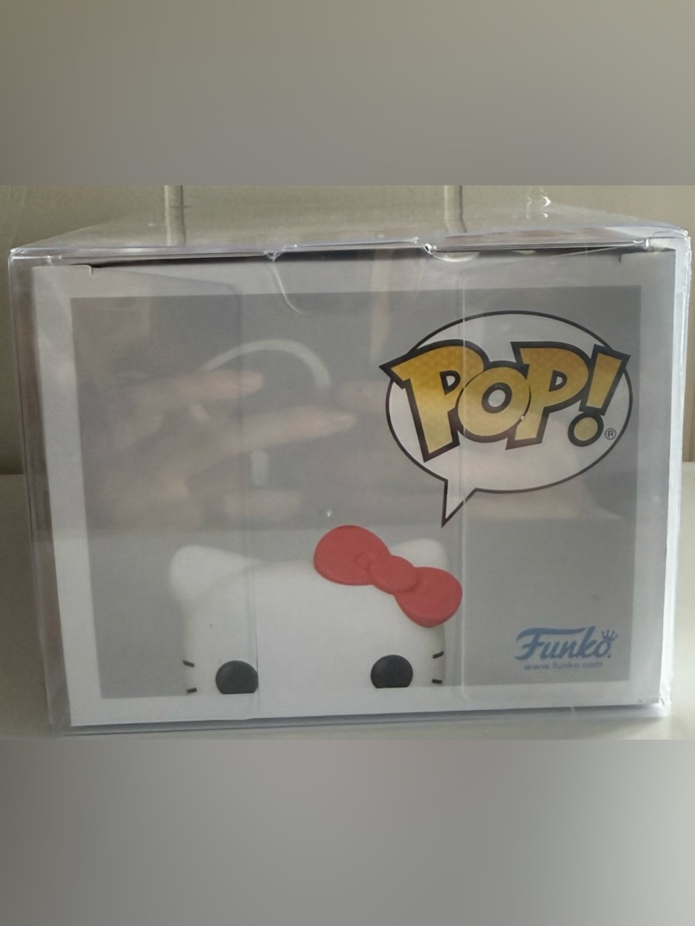 Funko Pop! Hello Kitty Flocked Figure with Red Bow and Blue Outfit - Picture 5 of 6
